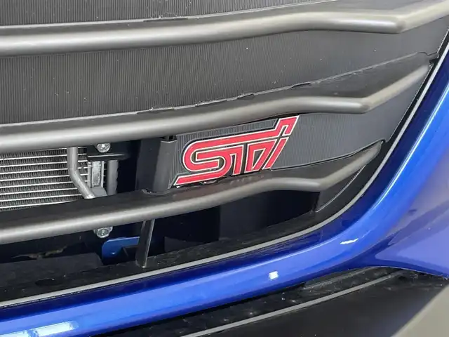 スバル ＢＲＺ STIスポーツ 群馬県 2024(令6)年 1.1万km WRブルーパール STIマフラー/STI Sport 専用装備　あり/・STIチューニング SACHS（ザックス）ダンパー（ZF製）&コイルスプリング/・18インチアルミホイール（ブラック塗装）/・STI製フレキシブルVバー/・STI製フレキシブルドロースティフナーフロント/・TFTカラーマルチインフォメーションディスプレイ付メーター/・アルカンターラ/本革シート（フロントシートヒーター付）/・SUBARU BRZ STI Sportエクステリア/［フロントバンパー、STIエンブレム（フロント&リヤ）、BRZエンブレム（ブラック）］フロントフェンダーガーニッシュ/＝＝＝＝/純正カロッツェリア9インチナビ（AVIC-CQ912)/・CD/DVD/USB/SD(MSV)/・HDMI/Bluetooth/フルセグTV/バックカメラ/アダプティブクルーズコントロール/リアビークルディテクション/ETC/LEDヘッドライト/オートライト /オートマチックハイビーム/スマートキー /プッシュスタート/バックソナー