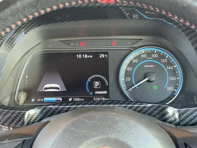 日産 リーフ ニスモ 鹿児島県 2018(平30)年 5.3万km ブリリアントホワイトパール/スーパーブラック 2トーン 純正ナビ/純正CD/DVD再生可/Blurtoothオーディオ/フルセグTV/全方位カメラ/追従型クルーズコントロール/前席シートヒーター/純正18インチアルミ/衝突軽減ブレーキ/プロパイロット/ステアリングヒーター/前後コーナーセンサー/前方ドライブレコーダー/革調シートカバー/充電ケーブル/新車時保証書/取扱説明書/スペアキー1本(スマートキー)