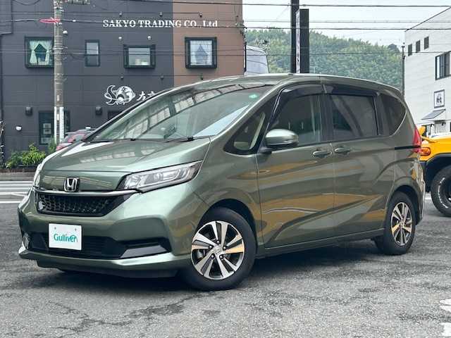 ホンダ フリード G ホンダセンシング 静岡県 2020(令2)年 3.9万km シルバーミストグリーンM 純正ナビ/フルセグTV/DVD/CD/MSV/BT/バックカメラ/ハーフレザーシート/両側パワースライドドア/前後ドライブレコーダー/衝突軽減ブレーキ/レーンキープアシスト/レーダークルーズコントロール/ビルトインETC/LEDヘッドライト/純正15インチAW/保証書/取扱説明書/ナビ取扱説明書