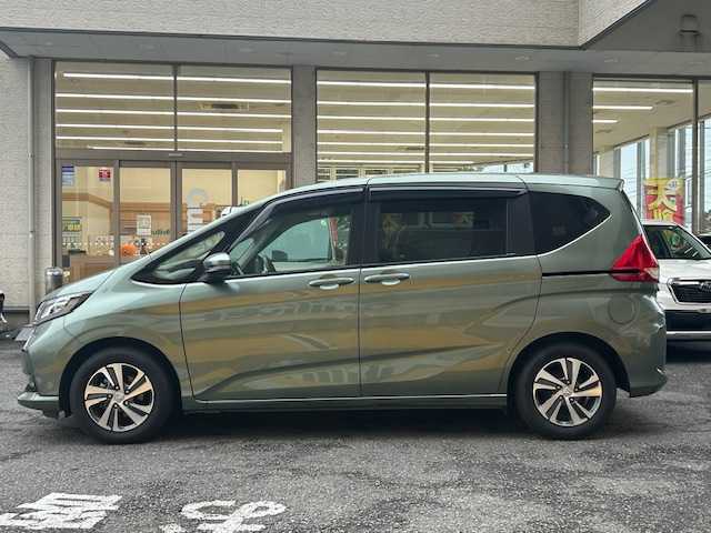 ホンダ フリード G ホンダセンシング 静岡県 2020(令2)年 3.9万km シルバーミストグリーンM 純正ナビ/フルセグTV/DVD/CD/MSV/BT/バックカメラ/ハーフレザーシート/両側パワースライドドア/前後ドライブレコーダー/衝突軽減ブレーキ/レーンキープアシスト/レーダークルーズコントロール/ビルトインETC/LEDヘッドライト/純正15インチAW/保証書/取扱説明書/ナビ取扱説明書
