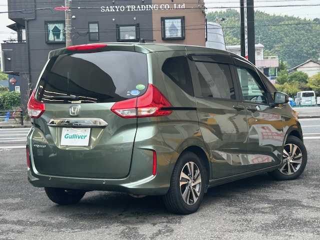 ホンダ フリード G ホンダセンシング 静岡県 2020(令2)年 3.9万km シルバーミストグリーンM 純正ナビ/フルセグTV/DVD/CD/MSV/BT/バックカメラ/ハーフレザーシート/両側パワースライドドア/前後ドライブレコーダー/衝突軽減ブレーキ/レーンキープアシスト/レーダークルーズコントロール/ビルトインETC/LEDヘッドライト/純正15インチAW/保証書/取扱説明書/ナビ取扱説明書