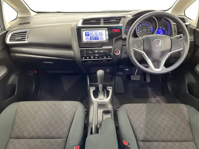 ホンダ フィット 13G Lパッケージ 栃木県 2014(平26)年 1.6万km プレミアムホワイトパール 純正メモリナビ/（CD/DVD/TV/Bluetooth/SD/AUX/iPod）/バックカメラ/前後ドライブレコーダー/禁煙車/オートライト/LEDヘッドライト/横滑り防止装置/スマートキー/プッシュスタート/アイドリングストップ/電動格納ミラー/純正フロアマット