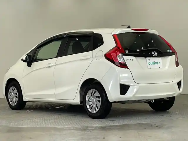 ホンダ フィット 13G Lパッケージ 栃木県 2014(平26)年 1.6万km プレミアムホワイトパール 純正メモリナビ/（CD/DVD/TV/Bluetooth/SD/AUX/iPod）/バックカメラ/前後ドライブレコーダー/禁煙車/オートライト/LEDヘッドライト/横滑り防止装置/スマートキー/プッシュスタート/アイドリングストップ/電動格納ミラー/純正フロアマット