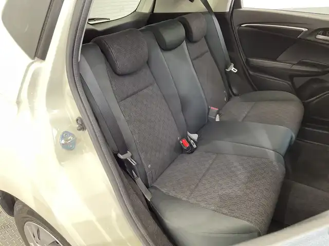 ホンダ フィット 13G Lパッケージ 栃木県 2014(平26)年 1.6万km プレミアムホワイトパール 純正メモリナビ/（CD/DVD/TV/Bluetooth/SD/AUX/iPod）/バックカメラ/前後ドライブレコーダー/禁煙車/オートライト/LEDヘッドライト/横滑り防止装置/スマートキー/プッシュスタート/アイドリングストップ/電動格納ミラー/純正フロアマット