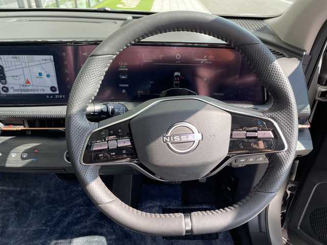 日産 アリア B6 愛知県 2022(令4)年 2万km シルバー プロパイロット2.0/ダイナミックパッケージ/ガラスルーフ/純正12.3型ディズプレイオーディオナビ/三眼LEDヘッドライト/全方位カメラ/クルーズコントロール/シートヒーター/バックカメラ/パワーシート/電動リアゲート/ヘッドアップディスプレイ/コーナーセンサー/純正アルミホイール/ETC2.0/ブラインドスポットモニター/ステアリングヒーター/インテリジェントミラー/オートマチックハイビーム/ドライブレコーダー/ワイヤレス充電機/衝突軽減システム/フルセグ/Bluetooth/ステアリングスイッチ/スマートキー/プッシュスタート