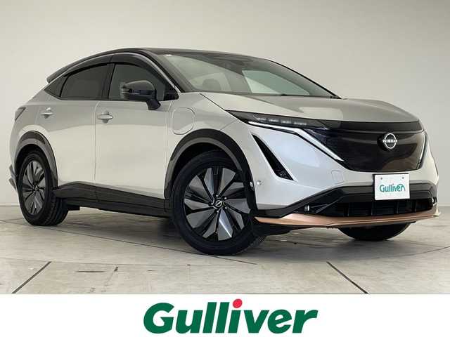 日産 アリア B6 愛知県 2022(令4)年 2万km シルバー プロパイロット2.0/ダイナミックパッケージ/ガラスルーフ/純正12.3型ディズプレイオーディオナビ/三眼LEDヘッドライト/全方位カメラ/クルーズコントロール/シートヒーター/バックカメラ/パワーシート/電動リアゲート/ヘッドアップディスプレイ/コーナーセンサー/純正アルミホイール/ETC2.0/ブラインドスポットモニター/ステアリングヒーター/インテリジェントミラー/オートマチックハイビーム/ドライブレコーダー/ワイヤレス充電機/衝突軽減システム/フルセグ/Bluetooth/ステアリングスイッチ/スマートキー/プッシュスタート