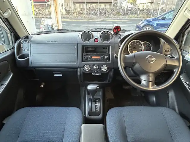 日産 キックス RX 千葉県 2009(平21)年 12.5万km ミディアムグレー 保証書、取扱説明書、スペアキー1本/FM/AM/CD/電動格納ミラー/ETC/ヘッドライト　ハロゲン/フォグライト　ハロゲン/シートヒーター/背面タイヤ/純正フロアマット/純正アルミホイール/サイドバイザー/4WD、寒冷地仕様