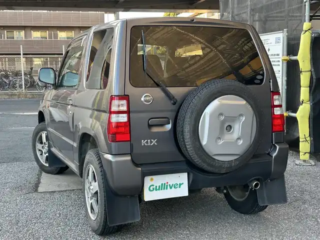 日産 キックス RX 千葉県 2009(平21)年 12.5万km ミディアムグレー 保証書、取扱説明書、スペアキー1本/FM/AM/CD/電動格納ミラー/ETC/ヘッドライト　ハロゲン/フォグライト　ハロゲン/シートヒーター/背面タイヤ/純正フロアマット/純正アルミホイール/サイドバイザー/4WD、寒冷地仕様