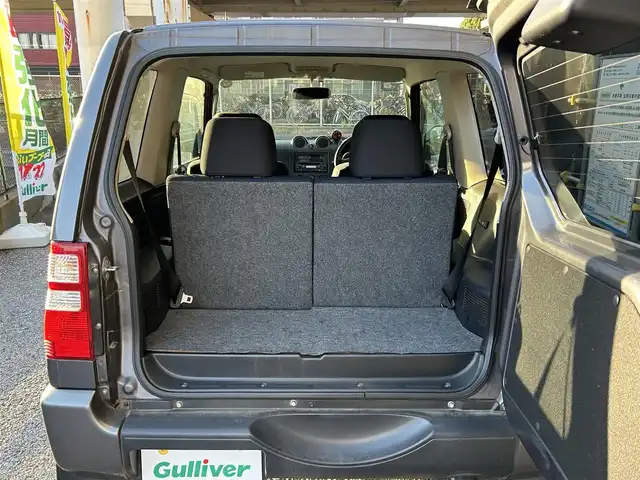 日産 キックス RX 千葉県 2009(平21)年 12.5万km ミディアムグレー 保証書、取扱説明書、スペアキー1本/FM/AM/CD/電動格納ミラー/ETC/ヘッドライト　ハロゲン/フォグライト　ハロゲン/シートヒーター/背面タイヤ/純正フロアマット/純正アルミホイール/サイドバイザー/4WD、寒冷地仕様