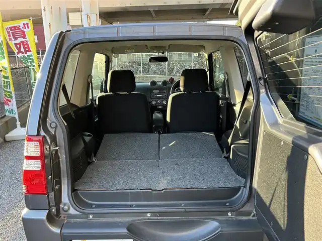 日産 キックス RX 千葉県 2009(平21)年 12.5万km ミディアムグレー 保証書、取扱説明書、スペアキー1本/FM/AM/CD/電動格納ミラー/ETC/ヘッドライト　ハロゲン/フォグライト　ハロゲン/シートヒーター/背面タイヤ/純正フロアマット/純正アルミホイール/サイドバイザー/4WD、寒冷地仕様