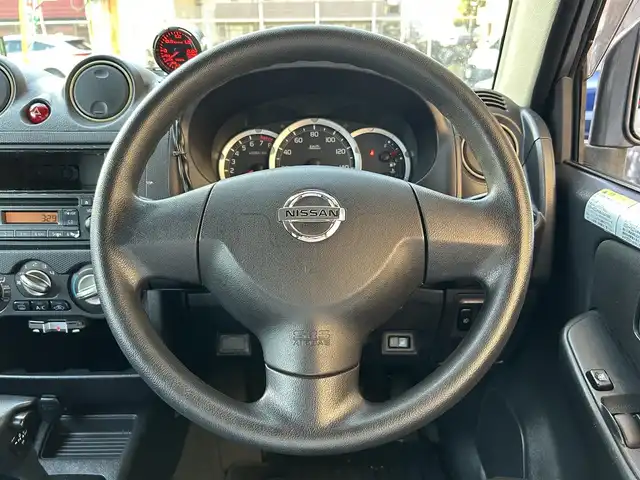 日産 キックス RX 千葉県 2009(平21)年 12.5万km ミディアムグレー 保証書、取扱説明書、スペアキー1本/FM/AM/CD/電動格納ミラー/ETC/ヘッドライト　ハロゲン/フォグライト　ハロゲン/シートヒーター/背面タイヤ/純正フロアマット/純正アルミホイール/サイドバイザー/4WD、寒冷地仕様