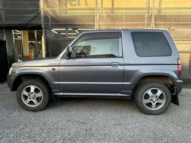 日産 キックス RX 千葉県 2009(平21)年 12.5万km ミディアムグレー 保証書、取扱説明書、スペアキー1本/FM/AM/CD/電動格納ミラー/ETC/ヘッドライト　ハロゲン/フォグライト　ハロゲン/シートヒーター/背面タイヤ/純正フロアマット/純正アルミホイール/サイドバイザー/4WD、寒冷地仕様