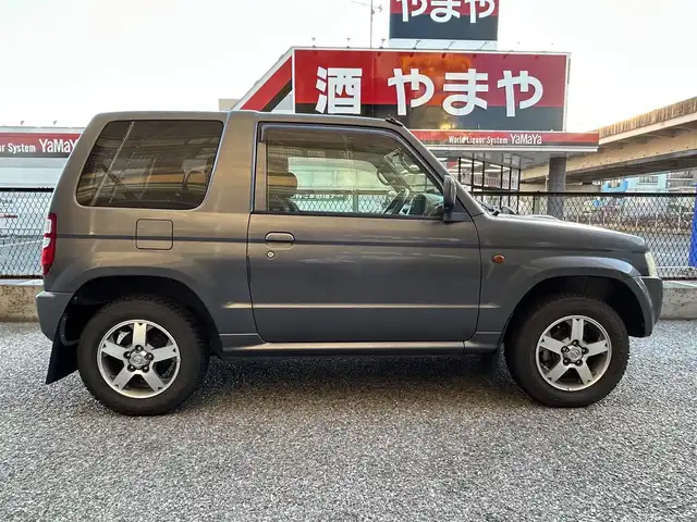 日産 キックス RX 千葉県 2009(平21)年 12.5万km ミディアムグレー 保証書、取扱説明書、スペアキー1本/FM/AM/CD/電動格納ミラー/ETC/ヘッドライト　ハロゲン/フォグライト　ハロゲン/シートヒーター/背面タイヤ/純正フロアマット/純正アルミホイール/サイドバイザー/4WD、寒冷地仕様