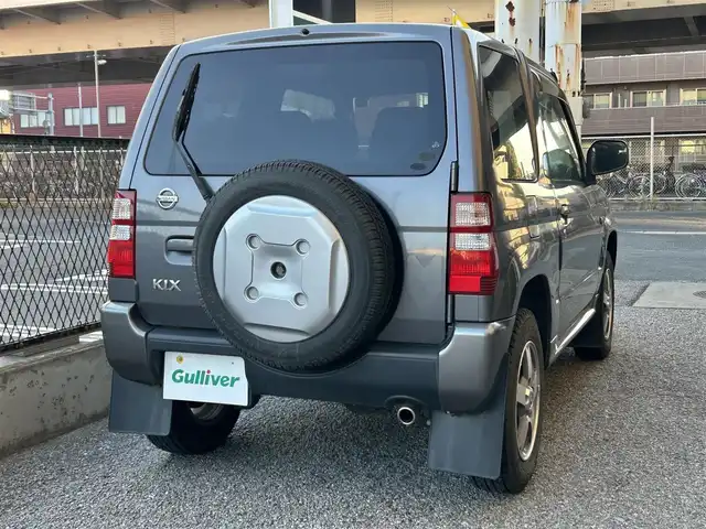 日産 キックス RX 千葉県 2009(平21)年 12.5万km ミディアムグレー 保証書、取扱説明書、スペアキー1本/FM/AM/CD/電動格納ミラー/ETC/ヘッドライト　ハロゲン/フォグライト　ハロゲン/シートヒーター/背面タイヤ/純正フロアマット/純正アルミホイール/サイドバイザー/4WD、寒冷地仕様