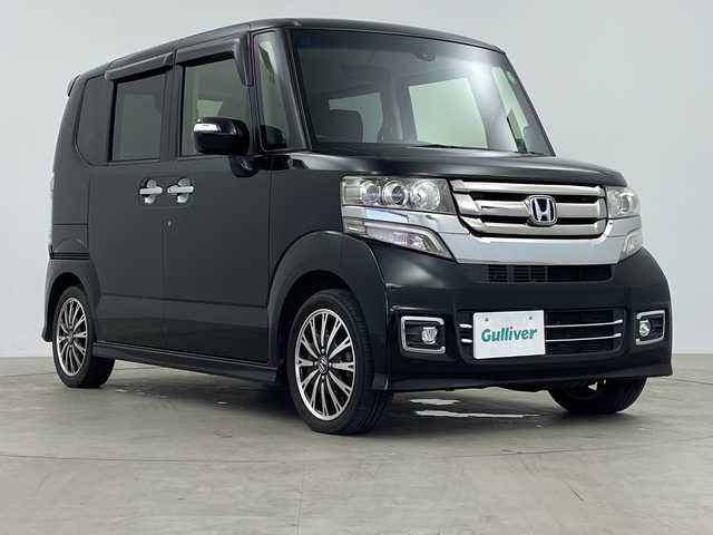 ホンダ Ｎ ＢＯＸ カスタム G ターボ Lパッケージ 鹿児島県 2015(平27)年 5.3万km スマートブラック 純正ナビ/(BT/FM/AM/CD/DVD/フルセグTV)/バックカメラ/クルーズコントロール/パドルシフト/両側パワースライドドア/ハーフレザーシート/ETC/CTBA/アイドリングストップ/スペアキー/純正キセノンヘッドライト/純正フロアマット/チップアップシート