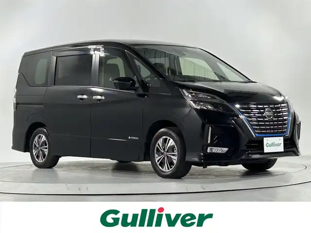 日産 セレナ e－パワー ハイウェイスター V 佐賀県 2020(令2)年 3.9万km ダイヤモンドブラック 純正10インチナビ(MM5210-L)/純正フリップダウンモニター/プロパイロット/デジタルインナーミラー/アラウンドビューモニター/両側パワースライドドア/前後ドライブレコーダー/ビルトインETC/ブラインドスポットモニター/前後コーナーセンサー/衝突被害軽減システム/横滑り防止装置/盗難防止装置/レーンキープアシスト/LEDヘッドライト/フォグランプ/カーテンエアバッグ/プッシュスタート/スマートキー/純正フロアマット/純正アルミホイール