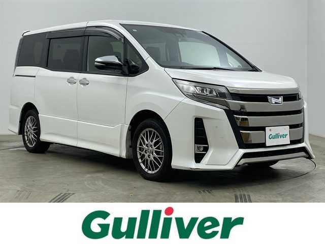 トヨタ ノア ハイブリッド Si ダブルバイビーⅢ 岡山県 2021(令3)年 5.5万km ホワイトパールクリスタルシャイン 純正SDナビ/【Bluetooth/フルセグTV】/衝突軽減ブレーキ/両側電動スライドドア/ビルトインＥＴＣ２．０/ＬＥＤヘッドライト/前席シートヒーター/クルーズコントロール/バックカメラ/オートハイビーム/社外ドライブレコーダー（前後）/踏み間違い防止/ISOFIX/後席サンシェイド/ステアリングスイッチ/チルトステアリング/シートリフター/シートバックテーブル/ウインカーミラー/ドアバイザー/スマートキー×2/取扱説明書/ナビ取扱説明書/新車保証書