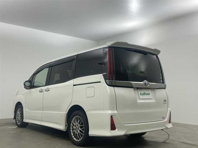 トヨタ ノア ハイブリッド Si ダブルバイビーⅢ 岡山県 2021(令3)年 5.5万km ホワイトパールクリスタルシャイン 純正SDナビ/【Bluetooth/フルセグTV】/衝突軽減ブレーキ/両側電動スライドドア/ビルトインＥＴＣ２．０/ＬＥＤヘッドライト/前席シートヒーター/クルーズコントロール/バックカメラ/オートハイビーム/社外ドライブレコーダー（前後）/踏み間違い防止/ISOFIX/後席サンシェイド/ステアリングスイッチ/チルトステアリング/シートリフター/シートバックテーブル/ウインカーミラー/ドアバイザー/スマートキー×2/取扱説明書/ナビ取扱説明書/新車保証書