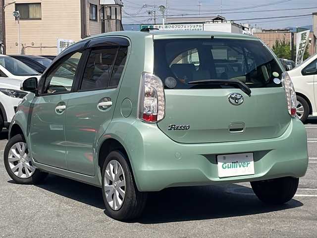 トヨタ パッソ プラスハナ Cパッケージ 京都府 2015(平27)年 1.9万km ウグイスメタリック ＣＤ　/フォグランプ　/電動格納ミラー　/ラジオ　/純正フロアマット　/ハロゲンライト　/アイドリングストップ　/ＡＢＳ　/横滑り防止　/イモビライザー　/パワーウィンドウ　/パワーステアリング　/リモコンキー　/Ｗエアバック
