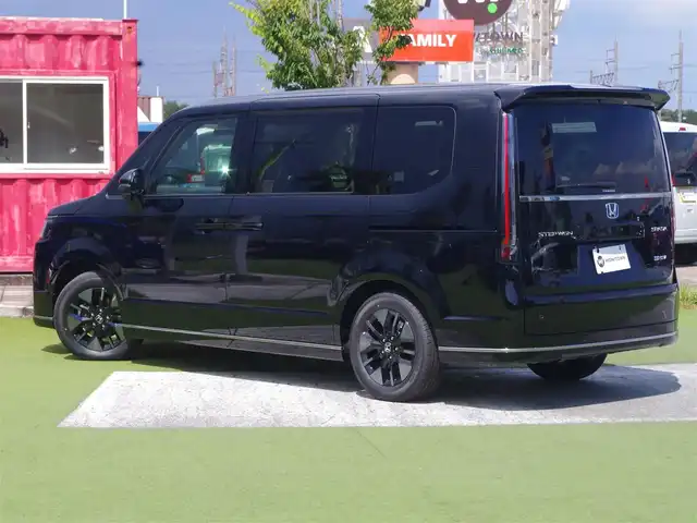 ホンダ ステップワゴン スパーダ eHEV 千葉県 2025(令7)年 0.1千km クリスタルブラックパール スパーダ　e:HEV　4CJ4AZ　11.4インチナビHonda CONNECTナビ LXM-247VFLi(317900円)/ホンダセンシング/・衝突軽減ブレーキ（CMBS）/・車線維持支援システム（LKAS）/・アダプティブクルーズコントロール（ACC）/・後方誤発進抑制機能/・誤発進抑制機能/・ブラインドスポットインフォメーション/パワーバックドア/両側パワースライドドア/ハーフレザーシート/前席シートヒーター/純正コネクトナビ/地デジTV/【DVD/CD再生機能　Bluetooth接続】/【Apple CarPlay　Android Auto対応】/バックカメラ/革巻きステアリング/ステアリングスイッチ/パドルシフト/LEDヘッドライト/フォグライト/ウインカーミラー/コーナーセンサー/純正16インチアルミホイル/サイド/カーテンエアバッグ/Honda スマートキー