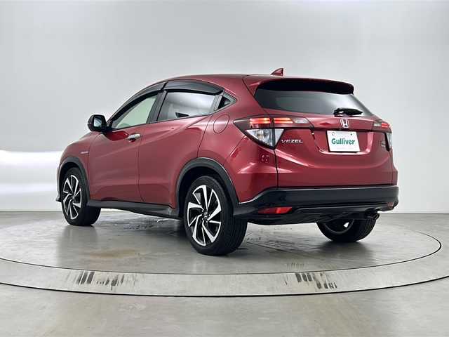 ホンダ ヴェゼル ハイブリッド RS ホンダセンシング 埼玉県 2017(平29)年 4.1万km プレミアムクリスタルレッドM 純正8インチナビ　VXM-175VFEi/バックカメラ/ETC/Honda SENSING/・衝突軽減ブレーキ/・アダプティブクルーズコントロール/・歩行者事故低減ステアリング/・路外逸脱抑制機能/・誤発進抑制機能/・先行車発進お知らせ機能/・標識認識機能/リアクティブフォースペダル/パドルシフト/運転席・助手席シートヒーター/スポーツモード/電子パーキングシステム/ブレーキホールド/アルミペダル/プッシュスタート/ステアリングリモコン/ウィンカーミラー/フロントフォグランプ/純正フロアマット/純正ドアバイザー/純正18インチアルミホイール