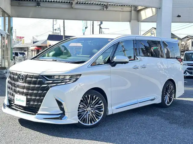 トヨタ アルファード Z 埼玉県 2024(令6)年 0.4万km プラチナホワイトパールマイカ ・ワンオーナー　/・パノラマルーフ　/・モデリスタエアロ　/・ユニバーサルステップ　/・WALD21インチアルミ（ジェニュインラインF-００１）/21インチ　　9.0J　/・純正アルミサマータイヤ付き車載　/・トヨタチームメイト　/・純正ナビTV　/・13.2インチ有機ELフリップダウンモニター　/・TVキャンセラー/・アラウンドビューモニター/・ETC２．０/・ヘットアップディスプレイ/・デジタルインナミラー/・前後ドライブレコーダー/・リアフィルム施工/・スマートキー×２/・プッシュスタート/・保証書/・取説