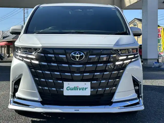 トヨタ アルファード Z 埼玉県 2024(令6)年 0.4万km プラチナホワイトパールマイカ ・ワンオーナー　/・パノラマルーフ　/・モデリスタエアロ　/・ユニバーサルステップ　/・WALD21インチアルミ（ジェニュインラインF-００１）/21インチ　　9.0J　/・純正アルミサマータイヤ付き車載　/・トヨタチームメイト　/・純正ナビTV　/・13.2インチ有機ELフリップダウンモニター　/・TVキャンセラー/・アラウンドビューモニター/・ETC２．０/・ヘットアップディスプレイ/・デジタルインナミラー/・前後ドライブレコーダー/・リアフィルム施工/・スマートキー×２/・プッシュスタート/・保証書/・取説