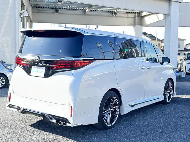 トヨタ アルファード Z 埼玉県 2024(令6)年 0.4万km プラチナホワイトパールマイカ ・ワンオーナー　/・パノラマルーフ　/・モデリスタエアロ　/・ユニバーサルステップ　/・WALD21インチアルミ（ジェニュインラインF-００１）/21インチ　　9.0J　/・純正アルミサマータイヤ付き車載　/・トヨタチームメイト　/・純正ナビTV　/・13.2インチ有機ELフリップダウンモニター　/・TVキャンセラー/・アラウンドビューモニター/・ETC２．０/・ヘットアップディスプレイ/・デジタルインナミラー/・前後ドライブレコーダー/・リアフィルム施工/・スマートキー×２/・プッシュスタート/・保証書/・取説