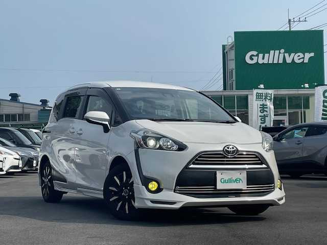 トヨタ シエンタ G 静岡県 2017(平29)年 5.7万km ホワイトパールクリスタルシャイン ●社外ナビ/（ワンセグ/CD/DVD/AUX）/(DNK-784A)/●衝突被害軽減ブレーキ/●レーンキープアシスト/●LED/●オートマチックハイビーム/●フォグランプ/●革巻きステアリング/●ステアリングスイッチ/●電動格納ウインカーミラー/●ETC/●純正フロアマット/●ドアバイザー/●TRDフルエアロ/●両側パワースライドドア/●プッシュスタート/●スペアキー/●スペアキー×1/●ENKEI製社外15インチアルミホイール/●ダブルSRS＋ABS/●保証書/●取扱説明書