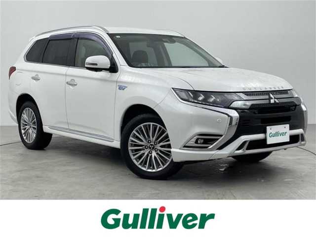 三菱 アウトランダー ＰＨＥＶ G 大分県 2019(平31)年 4.1万km シルキーホワイト 社外ナビ/（CD/DVD/BT/フルセグ）/全方位カメラ/衝突軽減ブレーキ/レーダークルーズコントロール/レーンキープアシスト/BSM/オートマチックハイビーム/D席パワーシート/前席シートヒーター/パワーバックドア/ステアリングヒーター/パドルシフト/前方ドライブレコーダー/電子パーキング/オートホールド/純正18インチアルミホイール/社外フロアマット/車両取扱説明書/保証書/スペアキー