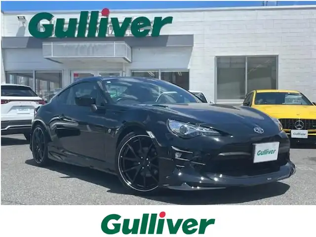 トヨタ ８６ GT リミテッド 三重県 2016(平28)年 4.5万km クリスタルブラックシリカ 後期型/モデリスタエアロ/225/35R19インチRAYSアルミホイール/GReddyマフラー/社外SDナビ/フルセグTV/【CD/DVD/SD/Bluetooth】/バックカメラ/ETC/パドルシフト/クルーズコントロール/ハーフレザーシート/D/N席シートヒーター/オートライト/LEDヘッドランプ/LEDフロントフォグランプ/プッシュスタート/スマートキー/スペアキー/純正フロアマット