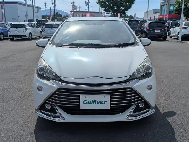 トヨタ アクア G G’s 福井県 2015(平27)年 4万km ライムホワイトパールクリスタルシャイン 純正17インチAW/LEDヘッドライト/Fフォグ/クルーズコントロール/バックカメラ/ETC/アイドリングストップ/純正7インチSDナビ/フルセグテレビ/横滑り防止装置/ダブルエアバッグ/純正フロアマット/スマートキー