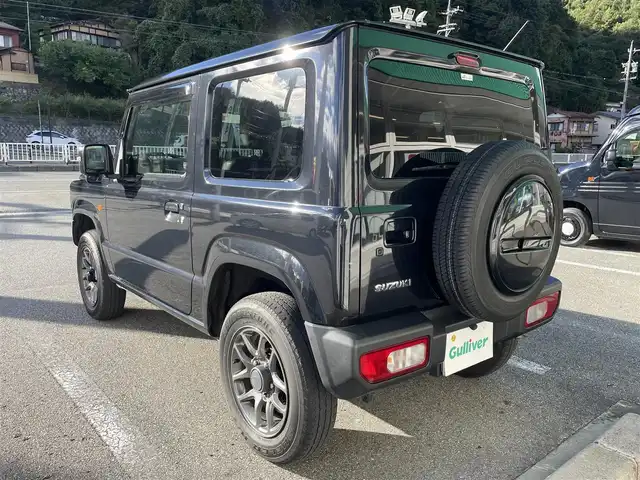 スズキ ジムニー XC 岐阜県 2019(令1)年 7.4万km ブルーイッシュブラックパール3 ワンオーナー/4WD/社外ナビ(AM/FM/CD/DVD)/クルーズコントロール/レーンキープアシスト/衝突軽減ブレーキ/ダウンヒルアシストコントロール/スマートキー/背面タイヤ/LEDヘッドライト・オート機能付/フォグランプ/ETC/ドライブレコーダー/純正アルミホイール/ウィンカーミラー/ドアバイザー/盗難防止装置/横滑り防止装置/保証書/取扱説明書/スペアキー/スタッドレスタイヤ車載