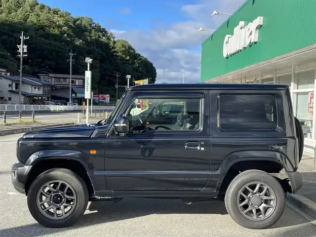 スズキ ジムニー XC 岐阜県 2019(令1)年 7.4万km ブルーイッシュブラックパール3 ワンオーナー/4WD/社外ナビ(AM/FM/CD/DVD)/クルーズコントロール/レーンキープアシスト/衝突軽減ブレーキ/ダウンヒルアシストコントロール/スマートキー/背面タイヤ/LEDヘッドライト・オート機能付/フォグランプ/ETC/ドライブレコーダー/純正アルミホイール/ウィンカーミラー/ドアバイザー/盗難防止装置/横滑り防止装置/保証書/取扱説明書/スペアキー/スタッドレスタイヤ車載