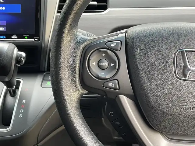 ホンダ フリード G ブラックスタイル 滋賀県 2023(令5)年 2.4万km プラチナホワイトパール 純正9インチナビ/【Bluetooth/CD/DVD/フルセグTV//AppleCarPlay/AndroidAuto】/バックカメラ/ETC/前後ドラレコ/両側パワースライドドア/シートヒーター/LEDヘッドライト/オートライト/ステアリングスイッチ/追従クルーズコントロール/レーンキープアシスト/スマートキー