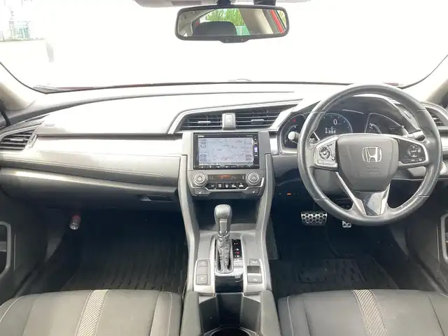 ホンダ シビック セダン 熊本県 2019(令1)年 7.4万km プレミアムクリスタルレッドM 純正ナビ(VXM-195VFi)/・AM/FM/CD/DVD/BT/・フルセグTV/・バックカメラ/ホンダセンシング/・衝突軽減ブレーキ/・路外逸脱抑制機能/・アダプティブクルーズコントロール/・車線維持支援システム/・オートハイビーム/・標識認識機能/ブレーキホールド/アイドリングストップ/ETC/電動トランク/LEDライト/フォグランプ/革巻きステアリング/・ステアリングスイッチ/・パドルシフト/ウィンカーミラー/電動格納ミラー/プッシュスタート/・スペアキー