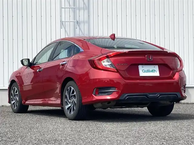 ホンダ シビック セダン 熊本県 2019(令1)年 7.4万km プレミアムクリスタルレッドM 純正ナビ(VXM-195VFi)/・AM/FM/CD/DVD/BT/・フルセグTV/・バックカメラ/ホンダセンシング/・衝突軽減ブレーキ/・路外逸脱抑制機能/・アダプティブクルーズコントロール/・車線維持支援システム/・オートハイビーム/・標識認識機能/ブレーキホールド/アイドリングストップ/ETC/電動トランク/LEDライト/フォグランプ/革巻きステアリング/・ステアリングスイッチ/・パドルシフト/ウィンカーミラー/電動格納ミラー/プッシュスタート/・スペアキー