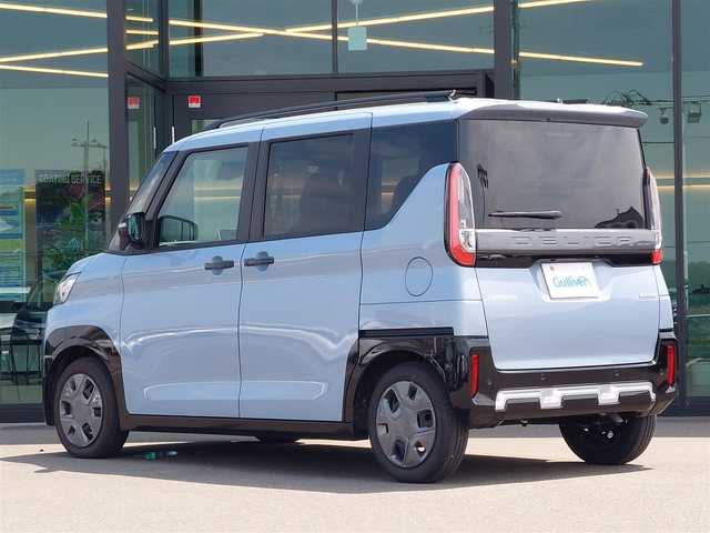 三菱 デリカミニ G 兵庫県 2024(令6)年 0.2万km ライトブルーⅡ 純正9インチナビ/バックカメラ/フルセグ/パワースライドドア/シートヒーター/ハーフレザーシート/ルーフレール/スマートキー/コーナーセンサー/アイドリングストップ/e-Assist/衝突被害軽減ブレーキシステム/踏み間違い衝突防止アシスト/車線逸脱警報システム
