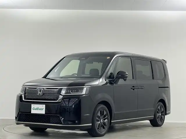 ホンダ ステップワゴン スパーダ eHEV 埼玉県 2025(令7)年 0.1千km クリスタルブラックパール 登録済未使用車 純正11.4型ナビ TV DVD BSM　レーダークルーズコントロール　コーナーセンサー　レーンアシスト　シートヒーター　電動リアゲート　バックカメラ　両側電動　ハーフレザーシート　禁煙車