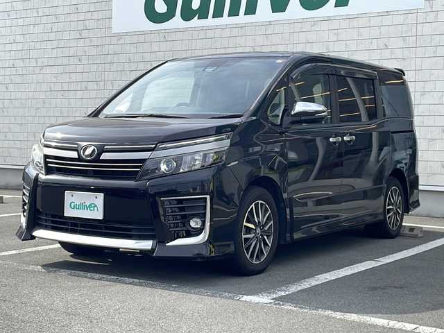 トヨタ ヴォクシー ZS 煌Ⅱ 静岡県 2016(平28)年 7.9万km ブラック プッシュスタート/スマートキー/純正ナビ/　フルセグTV/BTオーディオ/DVD/バックカメラ /両側パワースライドドア/オートライト/LEDヘッドライト/衝突軽減ブレーキ/レーンキープアシスト