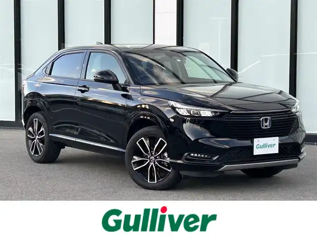 ホンダ ヴェゼル ハイブリッド e:HEV Z 大阪府 2023(令5)年 1.5万km クリスタルブラックパール ホンダセンシング/・アダプティクブクルーズコントロール/・衝突軽減ブレーキ/・レーンキープアシスト/・先行車発進お知らせ機能/・オートハイビーム/純正ナビ/・Bluetooth/フルセグTV/CD/DVD/USB/　ラジオ/主要装備/・横滑り防止装置/・ダウンヒルアシストコントロール/・BSM/・電動リアゲート/・ステアリングヒーター/・ステアリングスイッチ/・パドルシフト/・オートホールド/・置くだけ充電/・ハーフレザーシート/・シートヒーター/・チップアップシート/・ドライブレコーダー/・ETC2.0