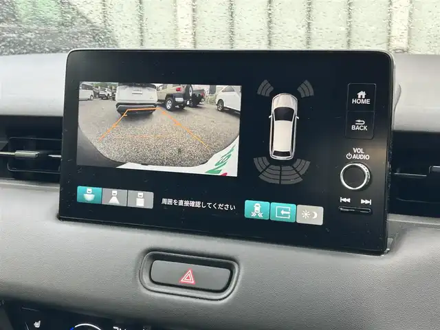 ホンダ ヴェゼル ハイブリッド e:HEV Z 大阪府 2023(令5)年 1.5万km クリスタルブラックパール ホンダセンシング/・アダプティクブクルーズコントロール/・衝突軽減ブレーキ/・レーンキープアシスト/・先行車発進お知らせ機能/・オートハイビーム/純正ナビ/・Bluetooth/フルセグTV/CD/DVD/USB/　ラジオ/主要装備/・横滑り防止装置/・ダウンヒルアシストコントロール/・BSM/・電動リアゲート/・ステアリングヒーター/・ステアリングスイッチ/・パドルシフト/・オートホールド/・置くだけ充電/・ハーフレザーシート/・シートヒーター/・チップアップシート/・ドライブレコーダー/・ETC2.0