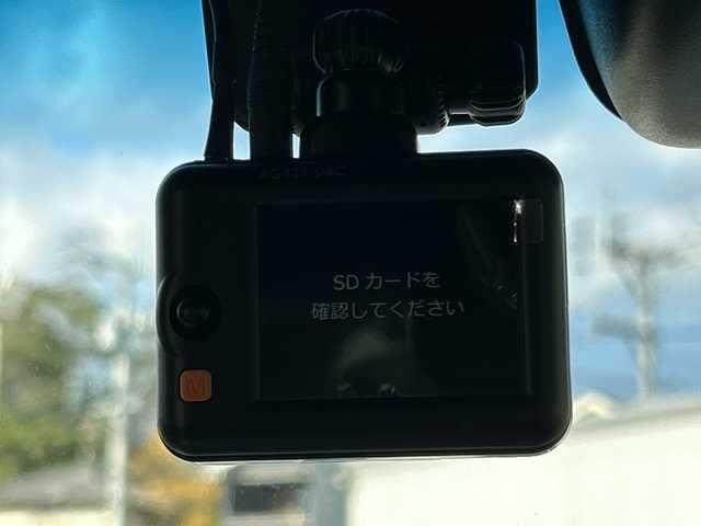 ホンダ Ｎ ＢＯＸ カスタム L スタイル+ブラック 福岡県 2023(令5)年 1.6万km プラチナホワイトパール 純正9型ナビ（BT/フルセグ/DISC)/Bカメラ/両側パワースライドドア/レーダークルーズコントロール/LEDヘッドライト/オートライト/フォグランプ/シートテーブル/無限フロアマット/純正14インチAW/アイドリングストップ/横滑り防止装置/後方コーナーセンサー/レーンキープアシスト/衝突被害軽減システム/後席サンシェード/ステアリングスイッチ/電動パーキングブレーキ/ISOFIX/プラズマクラスター/スマートキー/ETC/保証書/取扱説明書
