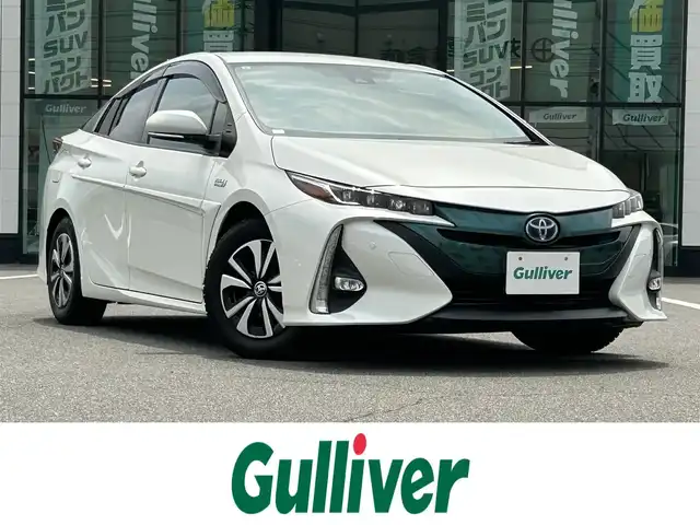トヨタ プリウス ＰＨＶ S ナビパッケージ 岡山県 2017(平29)年 6.1万km ホワイトパールクリスタルシャイン 登録時走行距離60124km/純正11.6インチナビ/フルセグTV(AM.FM.TV.BT)/バックカメラ/ETC2.0/ドライブレコーダー/シートヒーター/ステアリングヒーター/クリアランスソナー/衝突軽減ブレーキ/レーダークルーズコントロール/レーンキープアシスト/オートマチックハイビーム/アイドリングストップ/15インチ純正AW/純正フロアマット