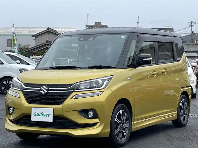 スズキ ソリオ バンディット HV MV 広島県 2019(令1)年 2.5万km ラッシュイエローメタリック/ブラック2トーンルーフ 登録時走行距離/　25105km/ワンオーナー/社外ナビ(CN-RZ743W)/　【CD/DVD/BT/フルセグTV】/クルーズコントロール(追従走行有り)/衝突被害軽減ブレーキ/車線逸脱警報/横滑り防止/シートヒーター/ビルトインETC/パドルシフト/オートライト/LEDライト/フォグランプ/スマートキー/プッシュスタート/アイドリングストップ/純正アルミホイール 15インチ/ドアバイザー/ウインカーミラー/純正フロアマット/スペアキー×1【スマートキー】/取扱説明書