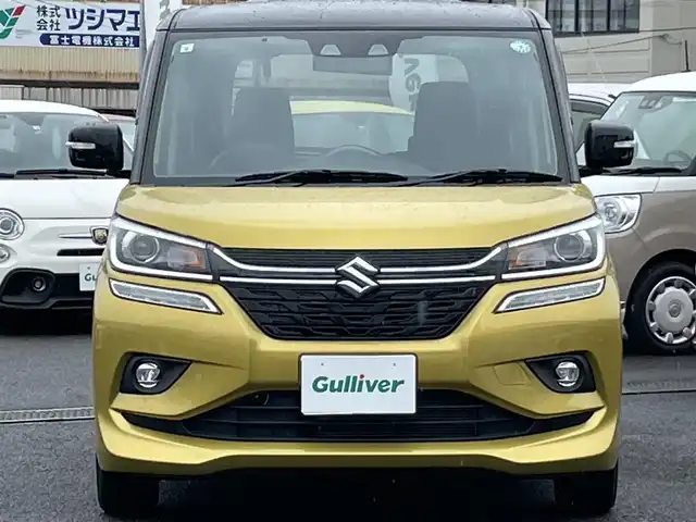 スズキ ソリオ バンディット HV MV 広島県 2019(令1)年 2.5万km ラッシュイエローメタリック/ブラック2トーンルーフ 登録時走行距離/　25105km/ワンオーナー/社外ナビ(CN-RZ743W)/　【CD/DVD/BT/フルセグTV】/クルーズコントロール(追従走行有り)/衝突被害軽減ブレーキ/車線逸脱警報/横滑り防止/シートヒーター/ビルトインETC/パドルシフト/オートライト/LEDライト/フォグランプ/スマートキー/プッシュスタート/アイドリングストップ/純正アルミホイール 15インチ/ドアバイザー/ウインカーミラー/純正フロアマット/スペアキー×1【スマートキー】/取扱説明書