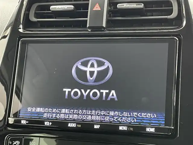 トヨタ プリウス A ツーリングセレクション 岡山県 2020(令2)年 4.8万km ホワイトパールクリスタルシャイン 純正９インチナビ/（フルセグ/Bluetooth/CD/DVD）/パノラミックビューモニター/衝突軽減ブレーキ/追従型クルーズコントロール/ビルトインＥＴＣ２．０/ＬＥＤヘッドライト/オートハイビーム/前席シートヒーター/ドライブレコーダー（前）/パーキングアシスト/純正フロアマット/トノカバー/ブラインドスポットモニター/TVキャンセラー/ISOFIX/ステアリングスイッチ/ヘッドアップディスプレイ/チルトステアリング/シートリフター/ウインカーミラー/ドアバイザー/スマートキー×2/取扱説明書/新車保証書