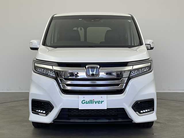ホンダ ステップワゴン スパーダ eHEV G EXホンダS 新潟県 2020(令2)年 5.6万km プラチナホワイトパール ディーラー純正9インチナビ/(CD.DVD.SD.フルセグ.Bluetooth)/バックカメラ/ステアリングリモコン/LEDオートライト/両側パワースライドドア/ドライブレコーダー/ハーフレザーシート/前席シートヒーター/レーダークルーズコントロール/レーンキープアシスト/プッシュスタート/スマートキー×2/純正フロアマット