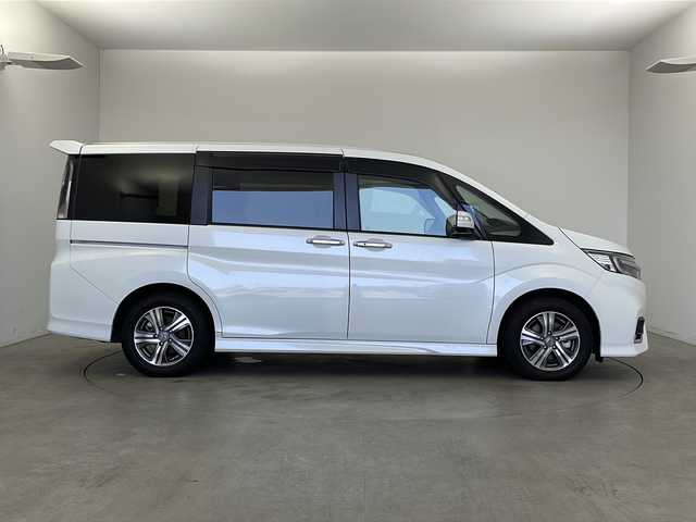 ホンダ ステップワゴン スパーダ eHEV G EXホンダS 新潟県 2020(令2)年 5.6万km プラチナホワイトパール ディーラー純正9インチナビ/(CD.DVD.SD.フルセグ.Bluetooth)/バックカメラ/ステアリングリモコン/LEDオートライト/両側パワースライドドア/ドライブレコーダー/ハーフレザーシート/前席シートヒーター/レーダークルーズコントロール/レーンキープアシスト/プッシュスタート/スマートキー×2/純正フロアマット