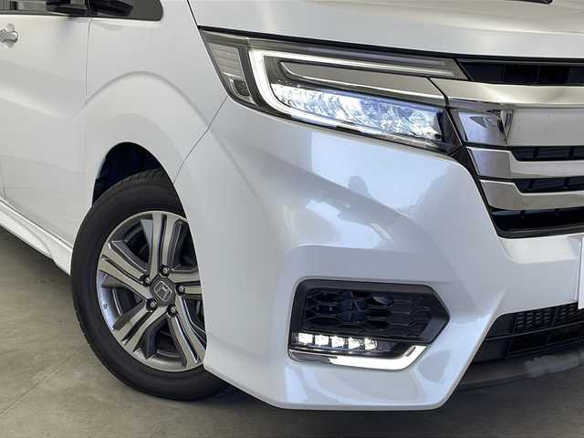ホンダ ステップワゴン スパーダ eHEV G EXホンダS 新潟県 2020(令2)年 5.6万km プラチナホワイトパール ディーラー純正9インチナビ/(CD.DVD.SD.フルセグ.Bluetooth)/バックカメラ/ステアリングリモコン/LEDオートライト/両側パワースライドドア/ドライブレコーダー/ハーフレザーシート/前席シートヒーター/レーダークルーズコントロール/レーンキープアシスト/プッシュスタート/スマートキー×2/純正フロアマット